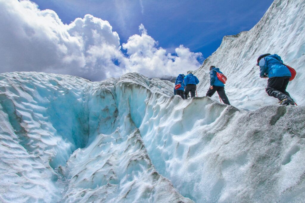 Escursionisti sul Franz Josef Glacier in Nuova Zelanda