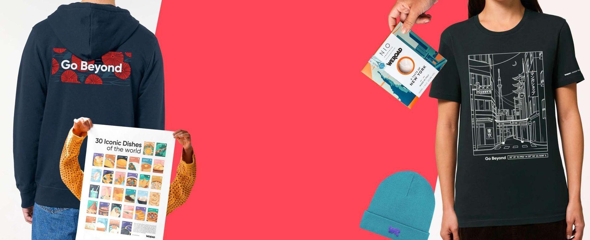 Una composizione flat lay di prodotti WeRoad, con felpa, maglietta, berretto, poster e cocktail box, su sfondo rosso.