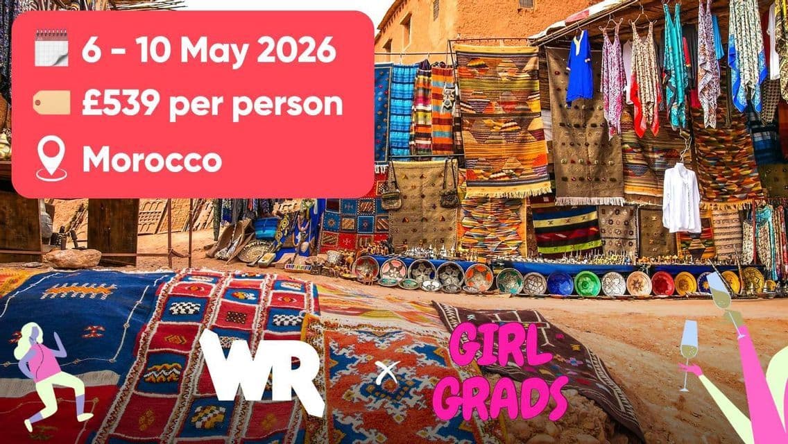 A promotional graphic for a WeRoad and Girl Grads trip to Morocco, showing a vibrant outdoor market with colorful rugs and textiles.