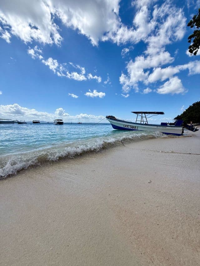 Beach in Bocas del Toro Boat moored off a sandy beach in Bocas del Toro, Panama