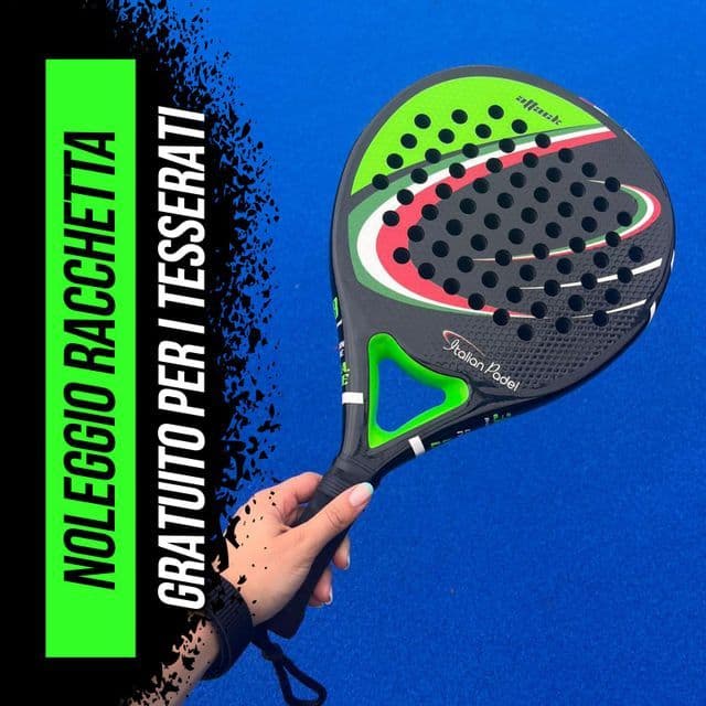 A person holds a black, green, and red padel racket above a blue playing court surface.