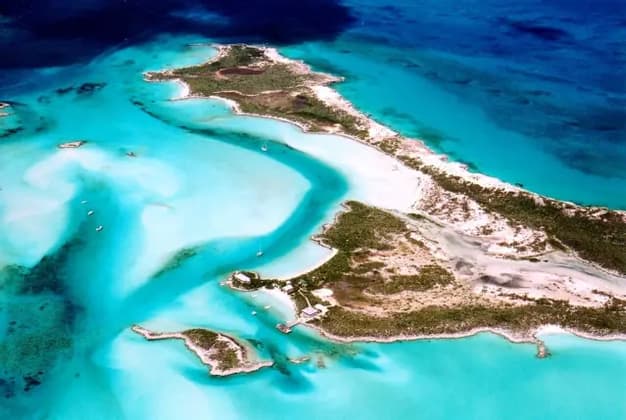 Aerial view of cays and sandbars in the turquoise sea of the Bahamas