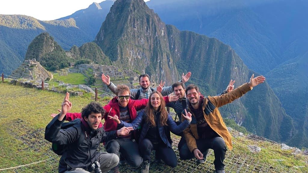 A Bending Spoons group posing in front of Machu Picchu