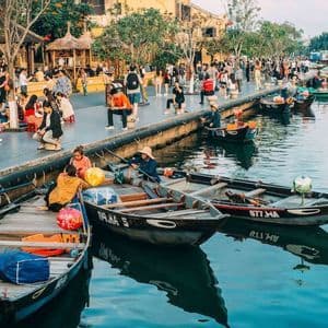 Hoi An riverfront Wooden boats on the Thu Bon river in front of Hoi An Old Town