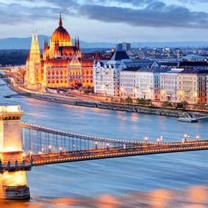 The Hungarian Parliament and the Budapest skyline above the Danube river.